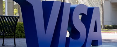 A statue of the blue Visa logo outside of Visa's Foster City, CA